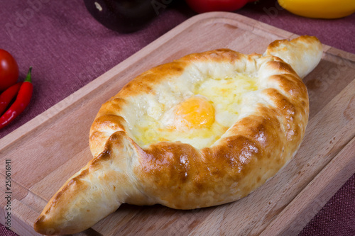 Baked flatbread with cheese and egg