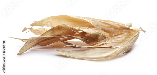 Dry, wilted corn, maize leaves isolated on white background