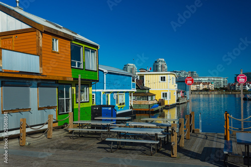 Colrful floating homes on a sunny day.