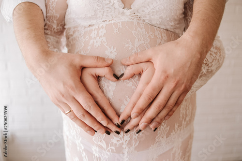 couple love hugging family pregnant woman