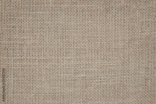 Vintage abstract Hessian or sackcloth fabric or hemp sack texture background. Wallpaper of artistic wale linen canvas.