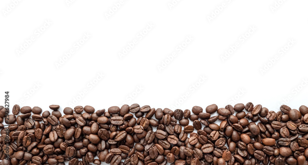 Roasted coffee beans isolated on white background. Close-up. Roasted coffee beans isolated on white background. Close-up.