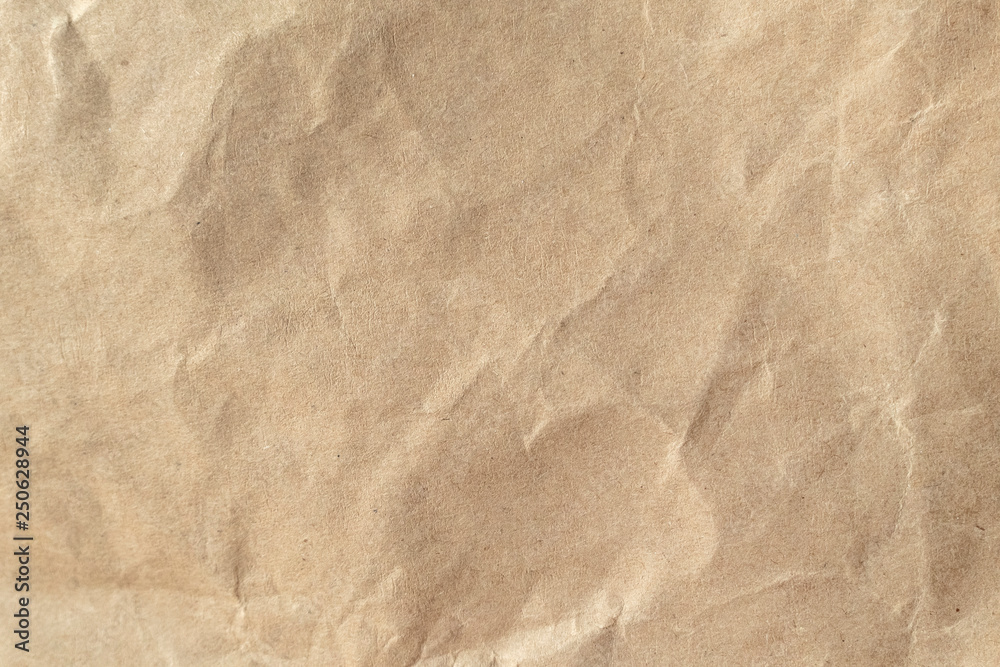 Naklejka premium Brown crumpled paper texture background.