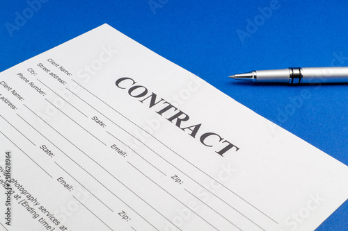 The contract for the blue table and pen.