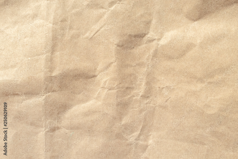 Obraz premium Brown crumpled paper texture background.