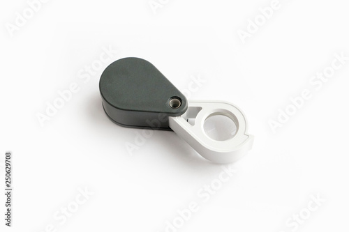 Magnifying glass for diamonds or see the amulet Isolated on a White Background.