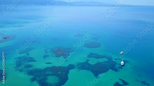 Wallpaper Mural Aerial view video from famous organised beach in small island of Monolia part of archipelago paradise exotic islands of Lihadonisia with clear turquoise sea beaches, North Evoia island, Greece Torontodigital.ca