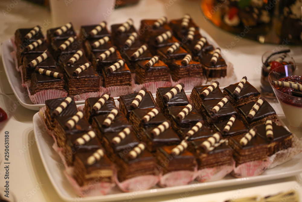 Delicious candy bar with macarons, cupcakes, cake pop and other sweets Delicious candy bar with macarons, cupcakes, cake pop and other sweets
