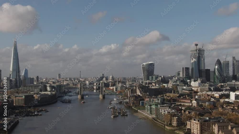 Aerial ascending view of Tower bridge and the City of London Aerial ascending view of Tower bridge and the City of London