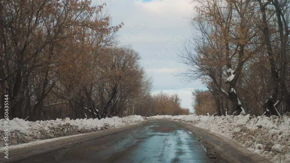 Cars on winter road lifestyle with snow. Dangerous automobile traffic in bad weather. Road in bad weather conditions in winter. trip in winter danger of bad weather Cars on winter road lifestyle with snow. Dangerous automobile traffic in bad weather. Road in bad weather conditions in winter. trip in winter danger of bad weather