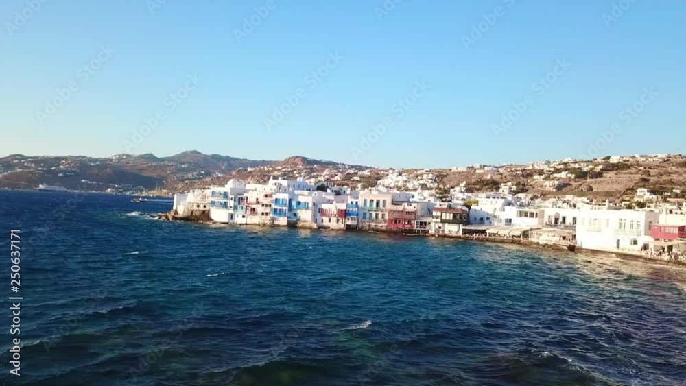Aerial drone bird's eye view video of iconic little Venice in chora of Mykonos island, Cyclades, Greece