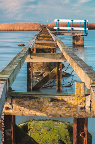 Wooden jetty to island photo