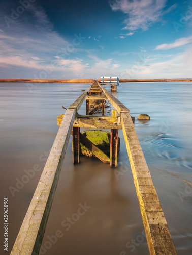 Wooden pier walkway photo