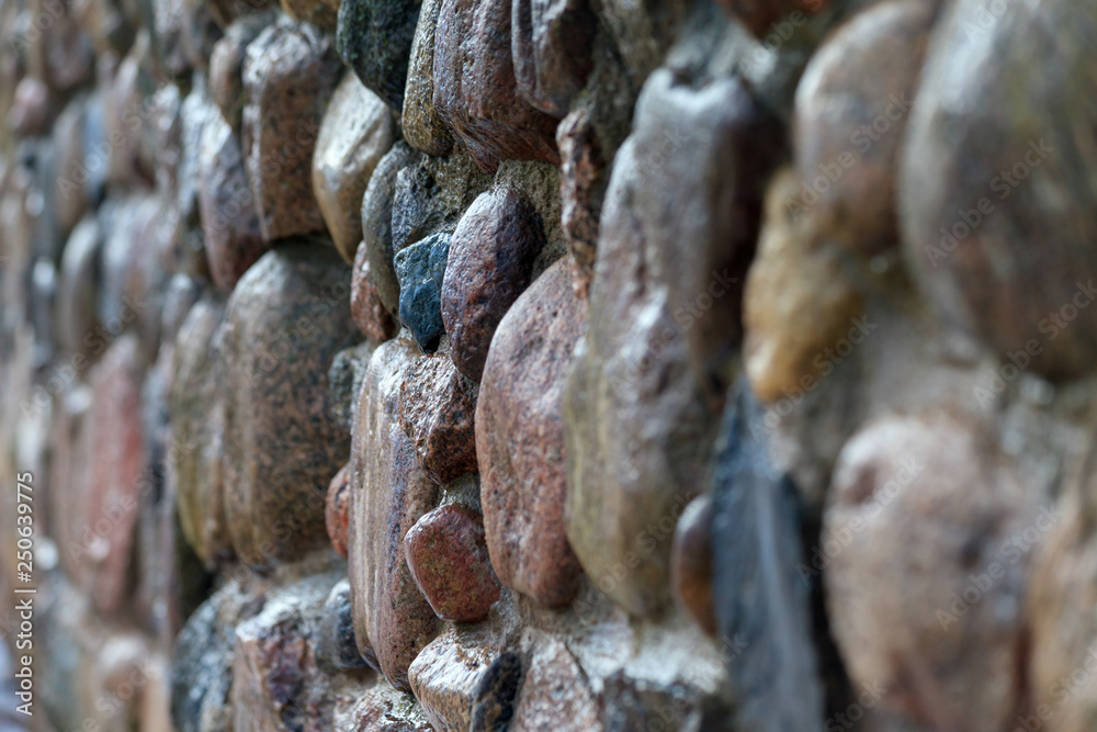 Walls made of natural stone with a layer of cement Walls made of natural stone with a layer of cement