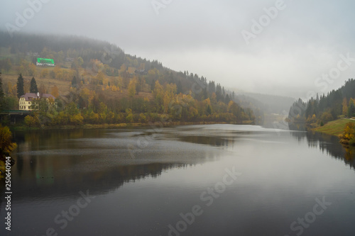 View of Elbe river and surrounding mountains - Giant Mountains (Krkonose). Small town of Spindleruv Mlyn and Labska village. Czech Republic.
