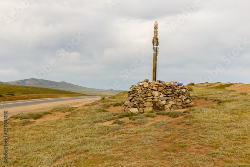 Mongolian Ovoo, Sacred pass in Mongolian desert mountains, Orkhon Mongolia. photo