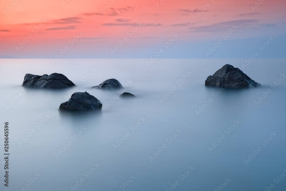 Scenic seascape with beautiful sky and stones in the foreground, long exposure, Black Sea, Russia