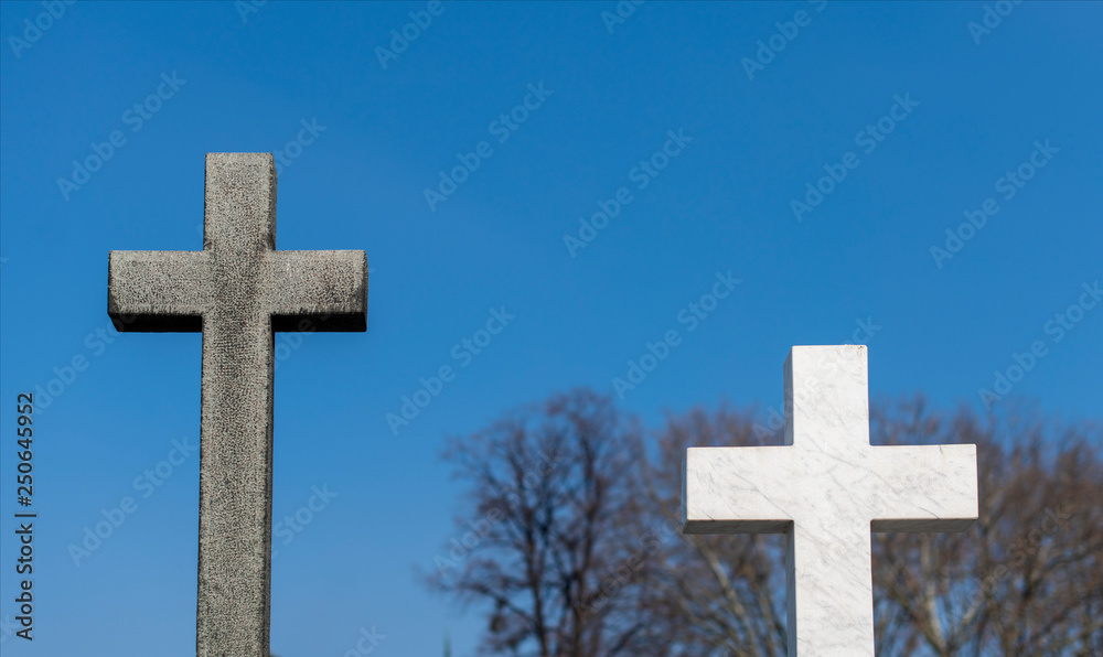 Graves with crosses at cemetery