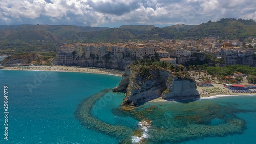 Obraz na płótnie Tropea, Calabria. Aerial view of city, monastery and coastline from drone perspective. w salonie