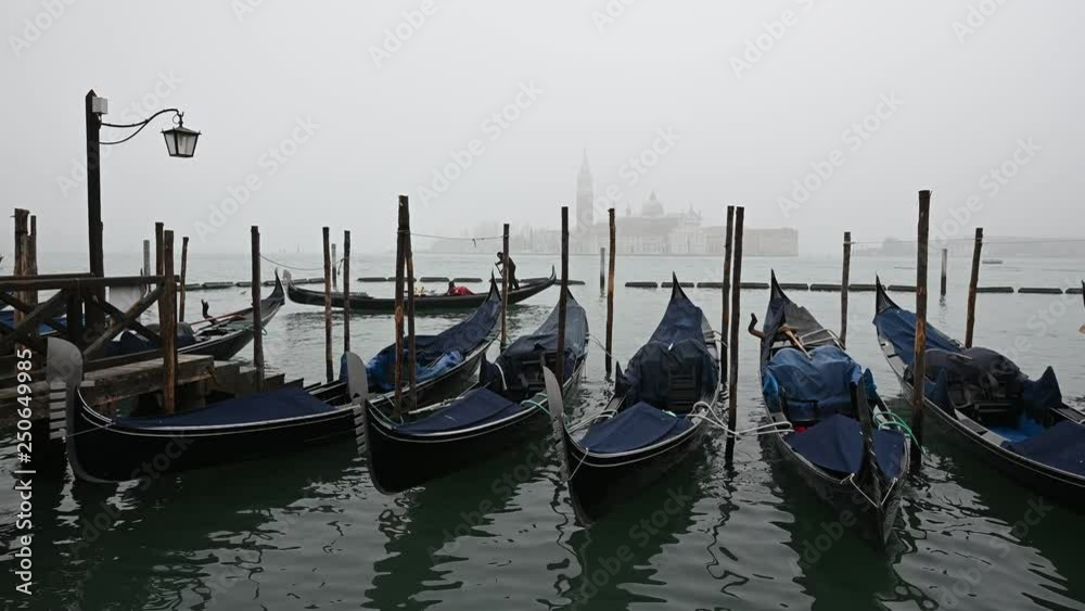 Venice, Italy - Palaces and Gondolas of the San Marco Basin wrapped in fog Venice, Italy - Palaces and Gondolas of the San Marco Basin wrapped in fog