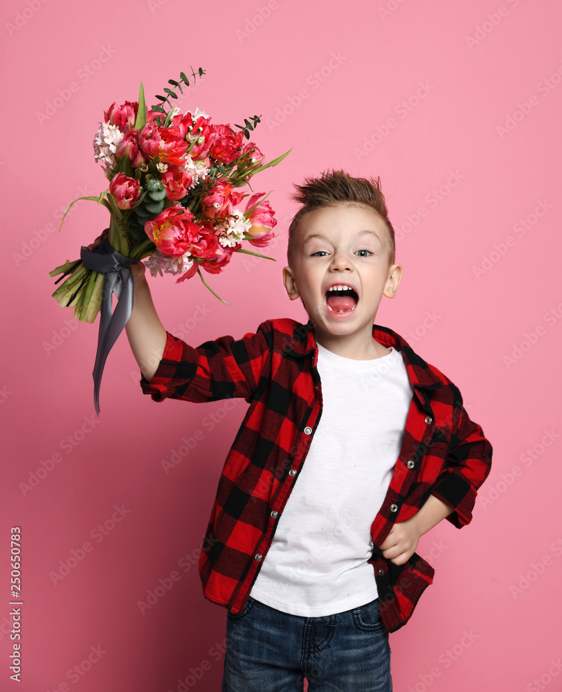offentlig brændstof krog Little boy kid in blue jeans white t-shirt and red shirt with a big bouquet  of spring flowers congratulates happily with a holiday Stock Photo | Adobe  Stock