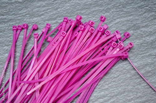 Close up of purple cable ties photo