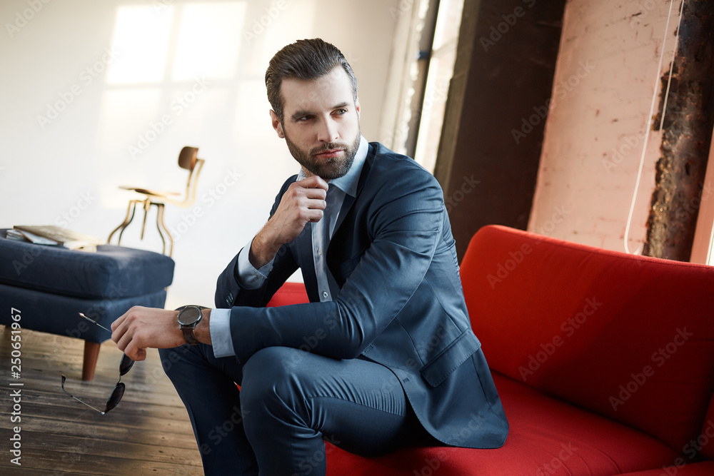 Stylish young man in a suit and bow tie. Business style. Fashionable image. Stylish young man in a suit and bow tie. Business style. Fashionable image.