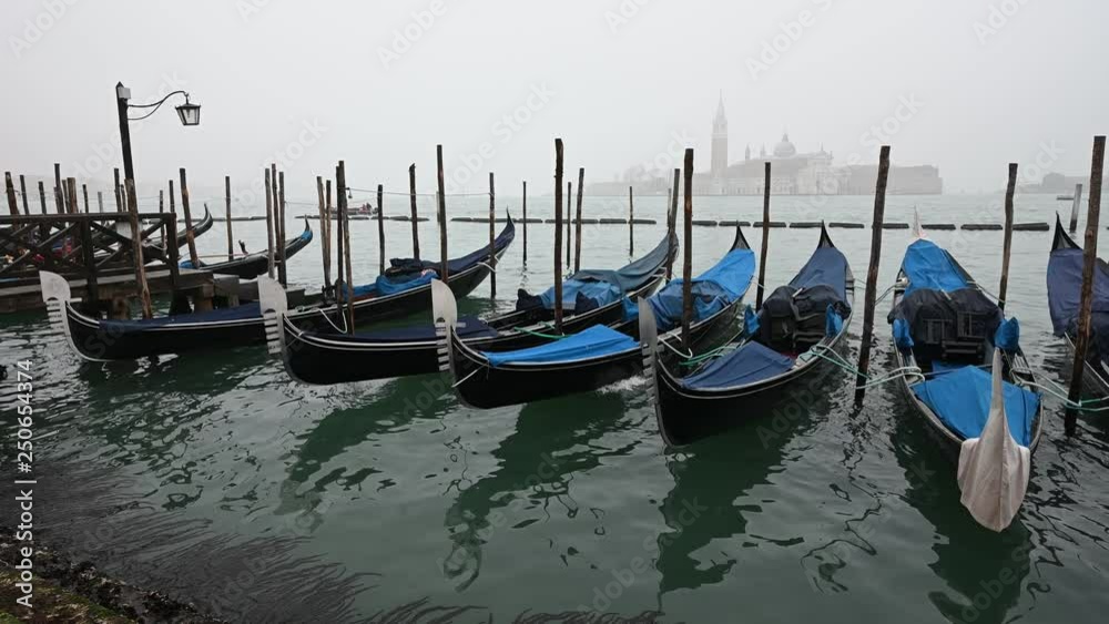 Venice, Italy - Palaces and Gondolas of the San Marco Basin wrapped in fog Venice, Italy - Palaces and Gondolas of the San Marco Basin wrapped in fog