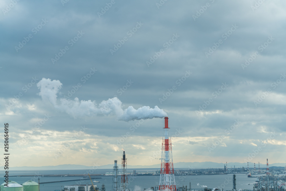 Industrial smoke stack in factory plant.