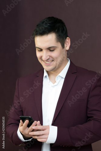 A man rejoices buying a mobile phone.