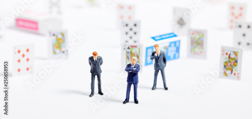 Miniature people : business man on Playing cards.