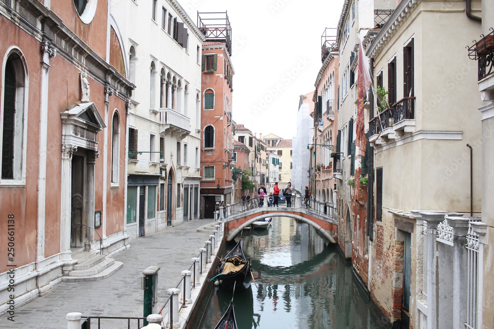 Ancient building surround with water in Venice on the canal, lifestyle in Italy, boat trip in Venezia, commercial advertisement