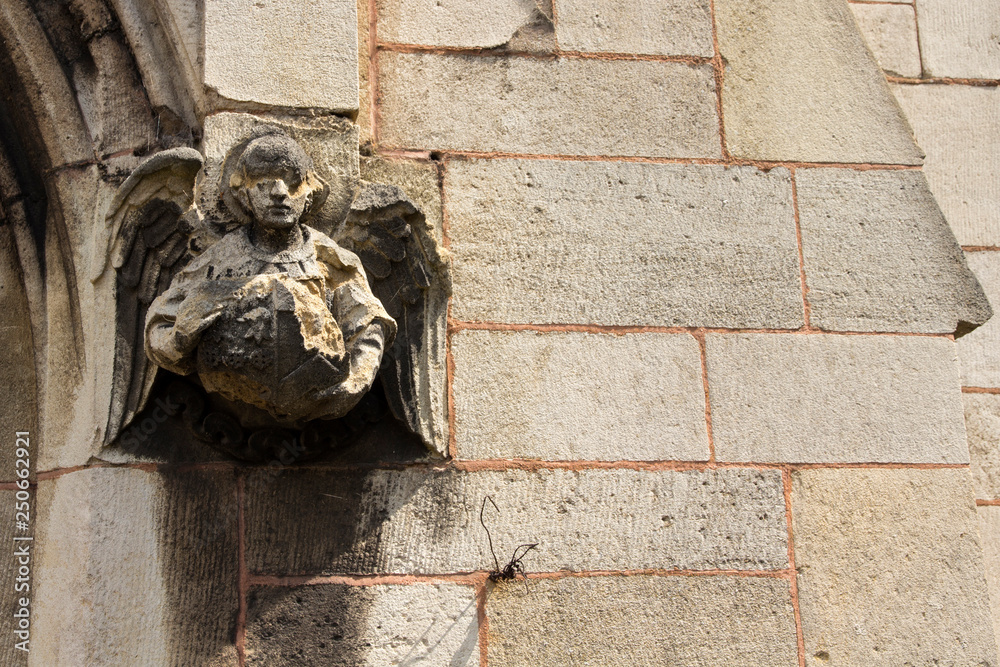 Angel on church wall.