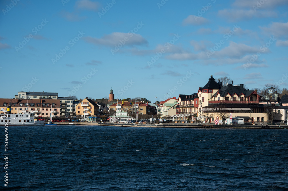 Houses, boats and sea at spring in Vaxholm and Stockholm archipelago