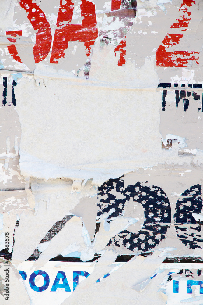 Fototapeta premium Torn posters on billboard.