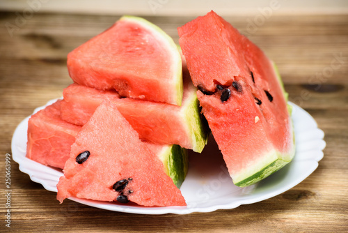 Watermelon cut into pieces on a plate