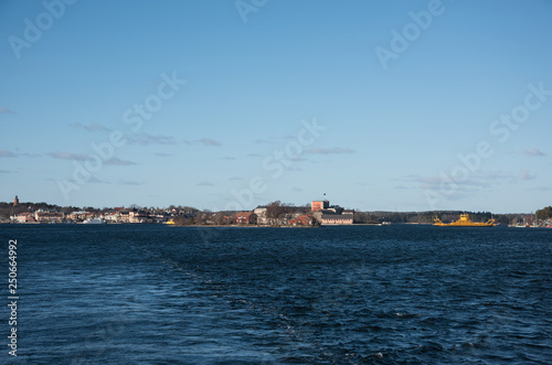 Houses, boats, ferrys and fortress island in Vaxholm and Stockholm archipelago