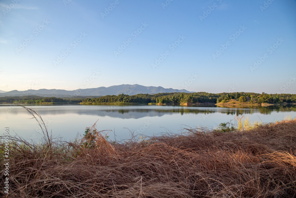 Pong Chor Reservoir in Mae Wang National Park Chiang Mai, Thailand. Photo in aerial view by drone with beautiful nature. Abstract of peaceful, peace wallpaper background. Pong Chor Reservoir in Mae Wang National Park Chiang Mai, Thailand. Photo in aerial view by drone with beautiful nature. Abstract of peaceful, peace wallpaper background.