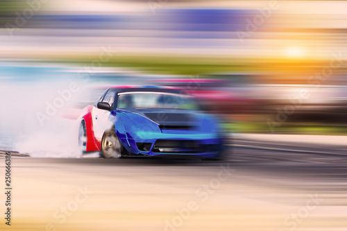 Blurred Race car drifting on speed track on twilight background.