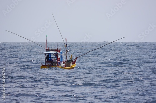 Fisher boat on the ocean in Sri Lanka
