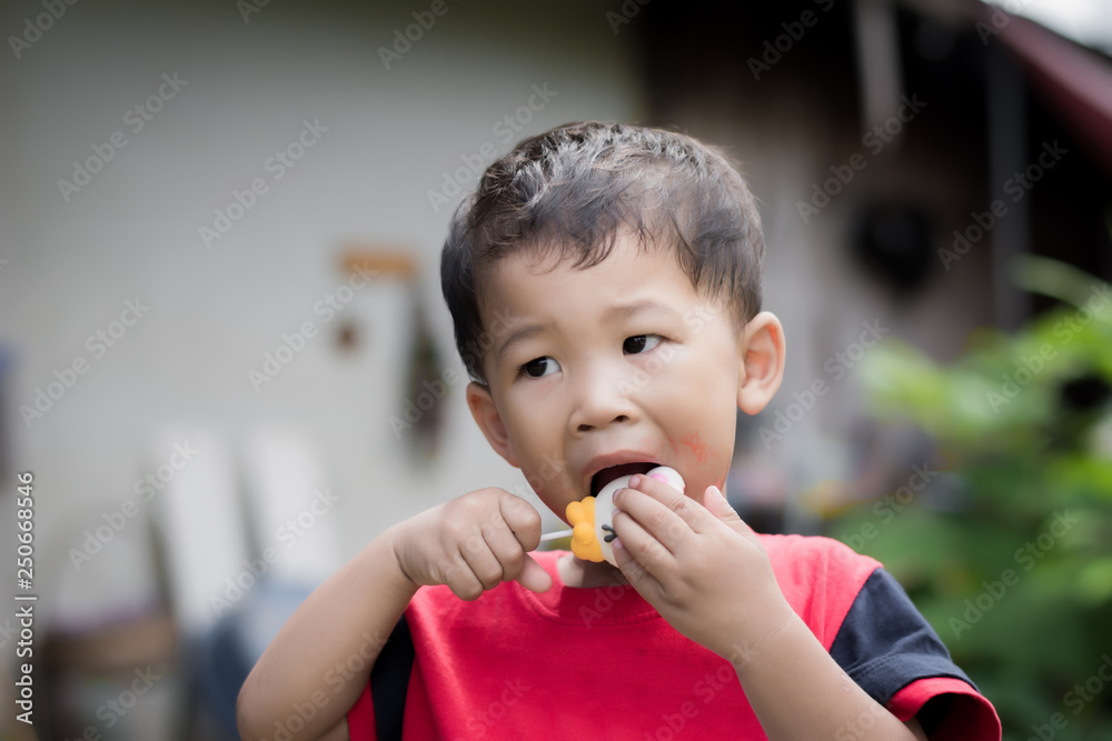 Children eating ice cream in the summer. Children eating ice cream in the summer.
