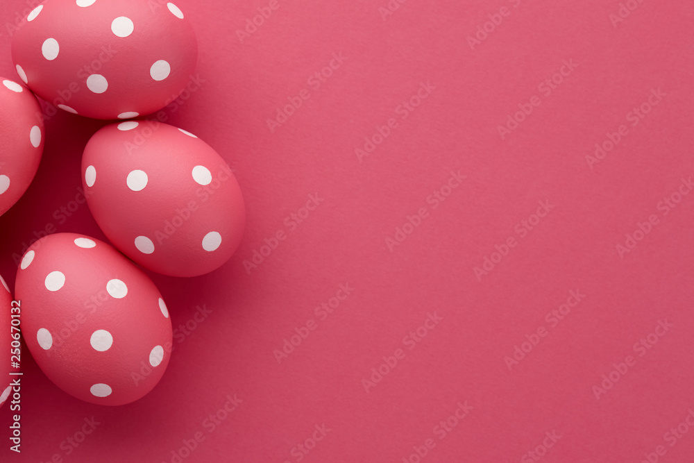 Pink dotted Easter eggs on pink background Pink dotted Easter eggs on pink background