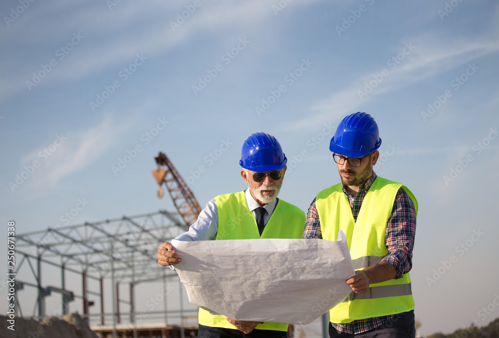 Engineers at construction site Engineers at construction site