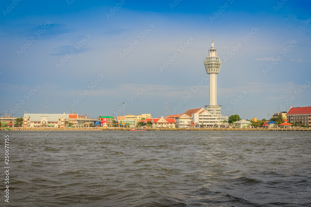 Riverfront view of Samut Prakan city hall with new observation tower and boat pier. Samut Prakan is at the mouth of the Chao Phraya River on Gulf of Thailand.