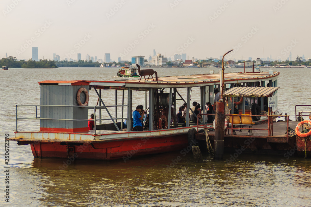 Samut Prakan, Thailand - March 25, 2017: Local ferry pier across Chao Phraya River at Amphur Muang district, Samut Prakarn, Thailand.