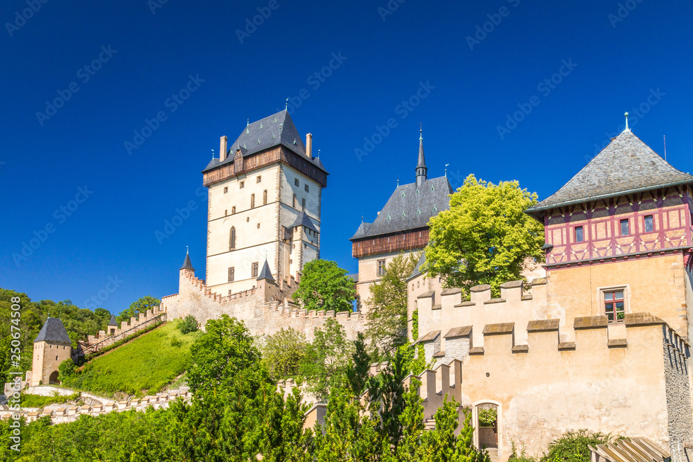 View of Karlstejn royal castle at sunny day,  located near of Prague, Czech Republic, Europe.