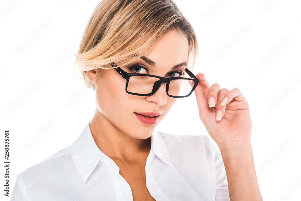 attractive blonde teacher in blouse putting on glasses isolated on white attractive blonde teacher in blouse putting on glasses isolated on white