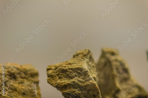 фотографія Skarns or tactites are calcium-bearing calc–silicate rocks and most often formed at the contact zone between intrusions of granitic magma bodies and carbonate sedimentary rocks such as limestone