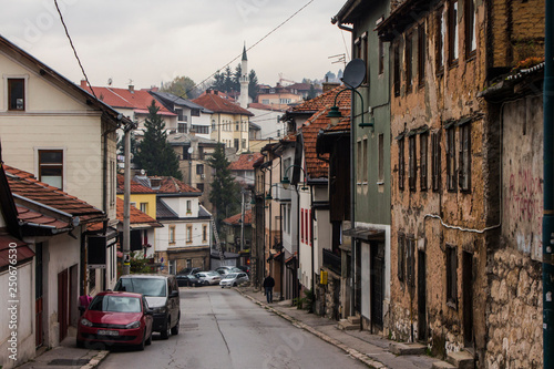 Narrow street in the historic district of Sarajevo in autumn. Bosnia and Herzegovina