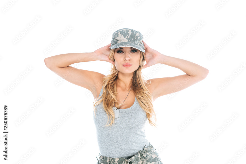 attractive militarywoman in grey t-shirt and camouflage cap isolated on white attractive militarywoman in grey t-shirt and camouflage cap isolated on white